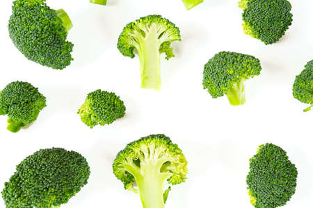 fresh broccoli isolated on whiteの写真素材