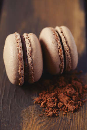 chocolate macaroon on brown wooden surface