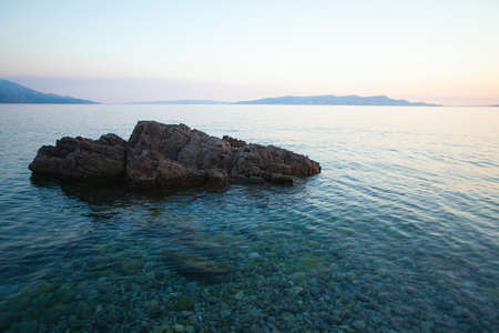 rock and sea in the eveningの写真素材