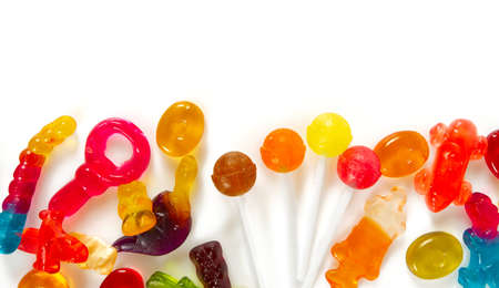 colorful candy assortment isolated on white backgroundの写真素材