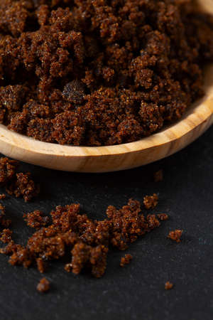 molasses sugar on wooden surfaceの写真素材