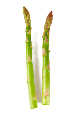 fresh green asparagus isolated on white backgroundの写真素材