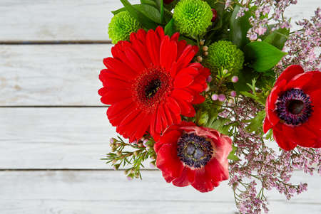 beautiful bouquet with red animones and gerbera flowersの写真素材