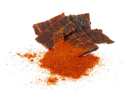 Beef jerky with hot pepper isolated on white background. Dried meat.の写真素材