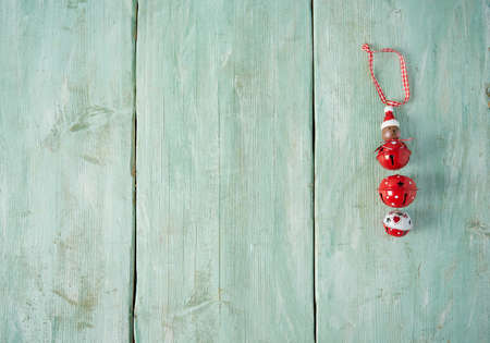 Christmas decorations on turquoise wooden surfaceの写真素材