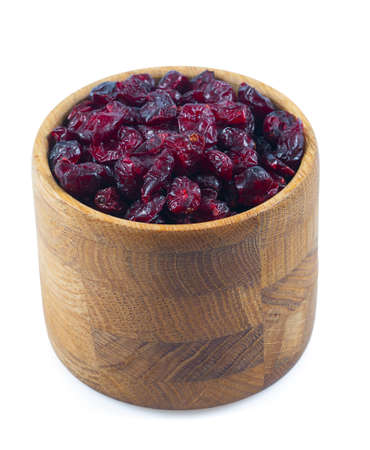 red feathers and wooden hearts on stone surfaceの写真素材