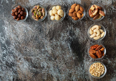 assortments of nuts on wooden surfaceの写真素材