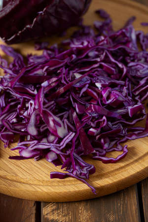 red cabbage on brown wooden surface