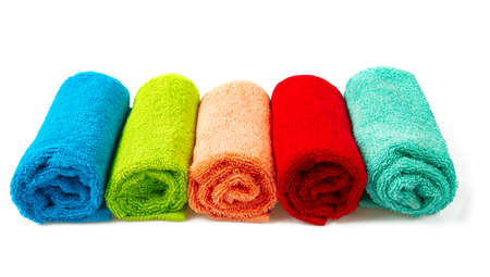 colorful towels isolated on white background, close upの写真素材