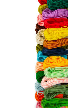 A set of multicolored threads for embroidery isolated on white bacground