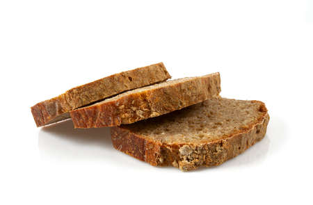 pieces of home made rye bread isolated on white background