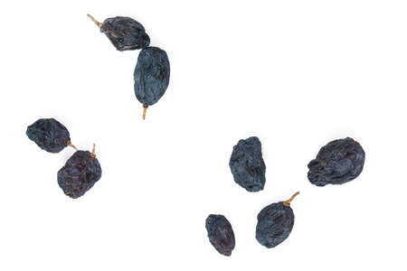 blue raisins isolated on white background, top view