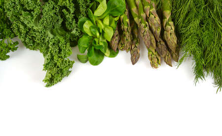 green herbs and vegetables isolated on white backgroundの写真素材