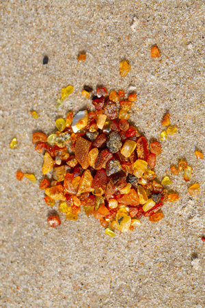pieces of amber (Lithuanian gold) lying on beach, top viewの写真素材