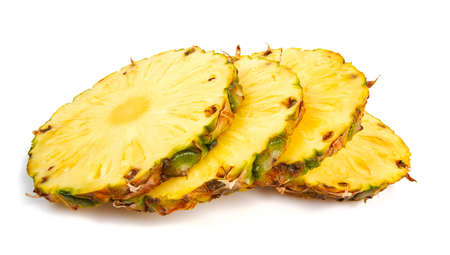 sliced pineapple isolated on white backgroundの写真素材