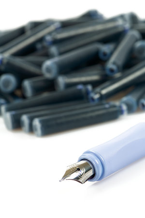 Ink pens and ink cartridges isolated on white backgroundの写真素材