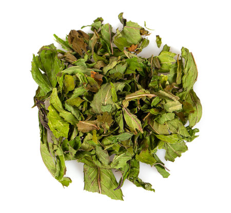 Dried mint leafs isolated on white background. Herbs and spices. Top view.の写真素材