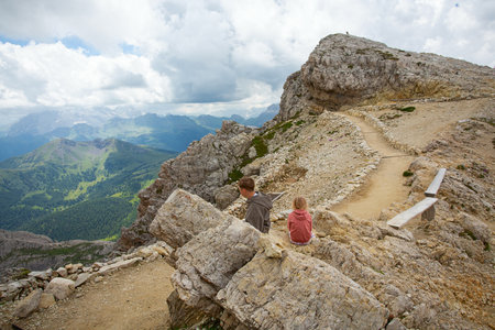 Brother and sister enjoying mountains in Italy. Italian Dolomites.のeditorial素材