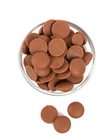 Tasty chocolate morsels isolated on white background.の写真素材