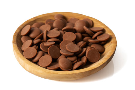 Tasty chocolate morsels isolated on white background.の写真素材
