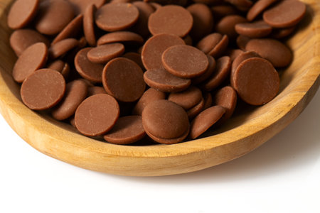 Tasty chocolate morsels isolated on white background.の写真素材