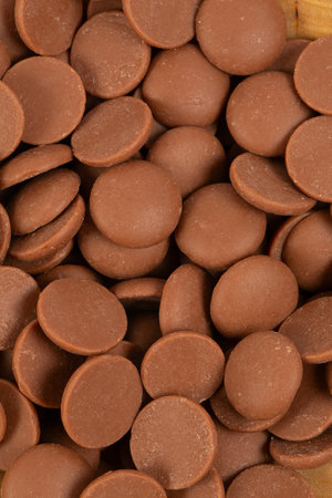Tasty chocolate morsels isolated on white background.の写真素材