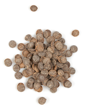 Dark hocolate morsels isolated on white background. Close up.の写真素材