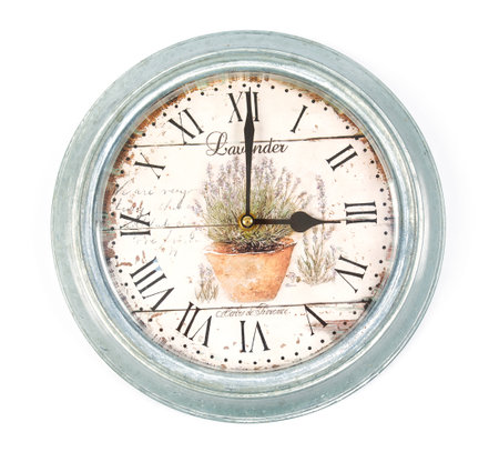 Beautiful vintage clock with lavender flowers isolated on white backgroundの写真素材