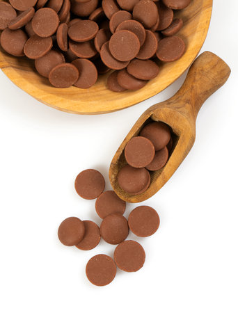 Tasty chocolate morsels isolated on white background.  Top view.の写真素材