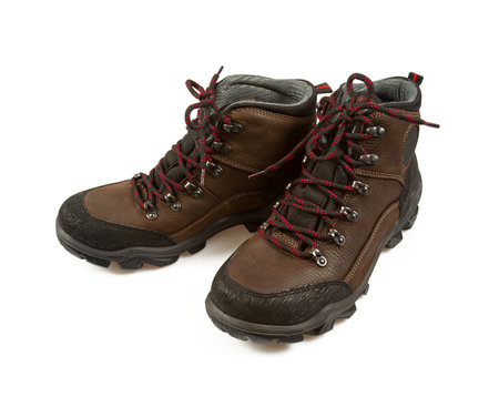 Pair of brown hiking boots isolated isolated on a white backgroundの写真素材