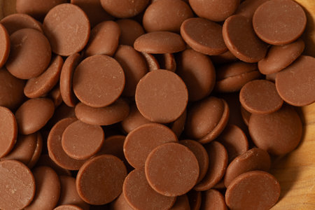 Tasty chocolate morsels isolated on white background.の写真素材