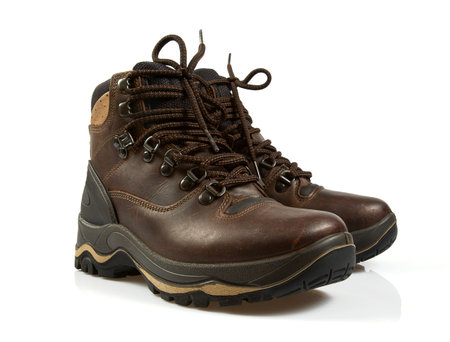 Pair of brown hiking boots isolated isolated on a white backgroundの写真素材