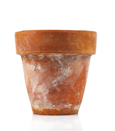 Old empty ceramic pot isolated on white background.の写真素材