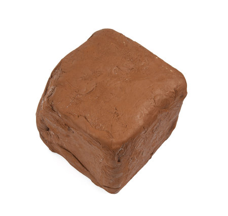 Natural clay piece isolated on white background. Wet clay material for sculpting or modeling.の写真素材