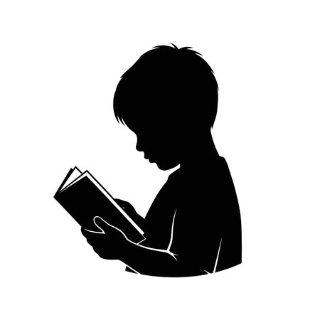 A  black silhouette of a child with short hair, focused intently on a book held in his hands, against a white background.のイラスト素材