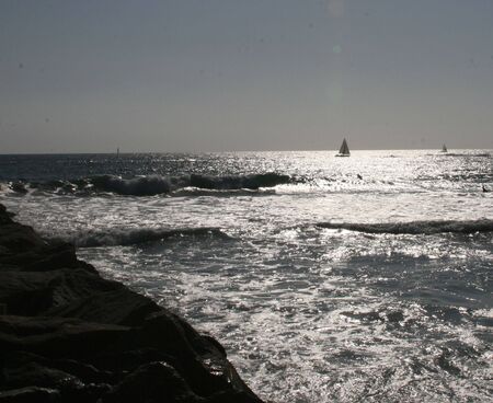 evening setting in on the oceanの写真素材