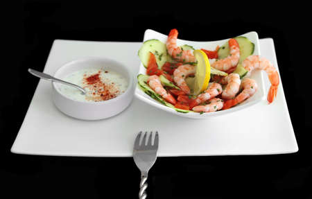 Shrimp & Cucumber with cream sauce on sideの写真素材