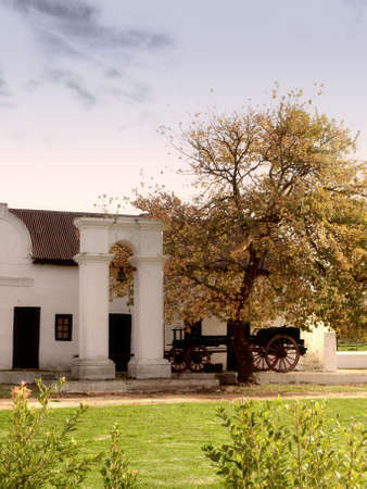 Slave bell and old Wagonの写真素材