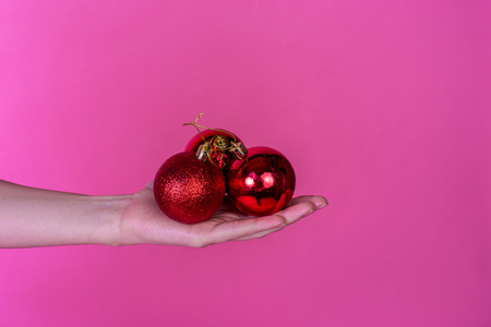 happy new year red colorful balls on bright holiday background pinkの写真素材