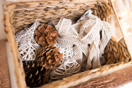 beautiful cones for the interior. beautiful decorations in a basket homeの写真素材