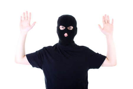 The surrendered criminal in a black maskの写真素材