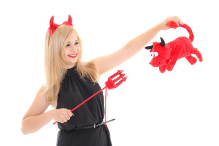Girl in imp costume with bull over white