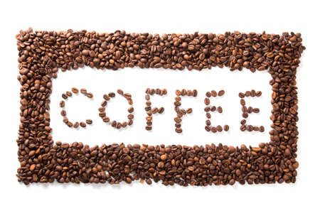 word coffee in frame, roasted beans isolated on white background