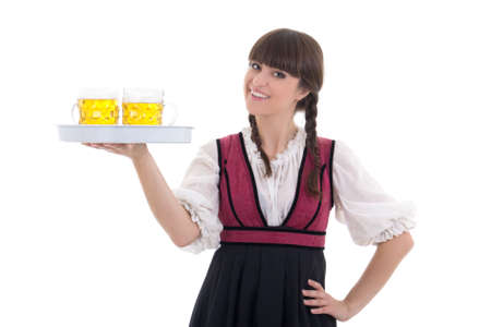 Happy waitress in bavarian dress with beer over whiteの写真素材