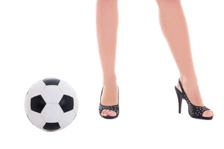 sexy female legs and soccer ball isolated on white backgroundの写真素材