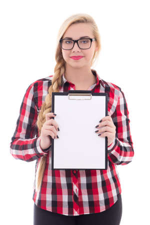 attractive teenage girl in eyeglasses holding empty blank in her hand isolated on white backgroundの写真素材