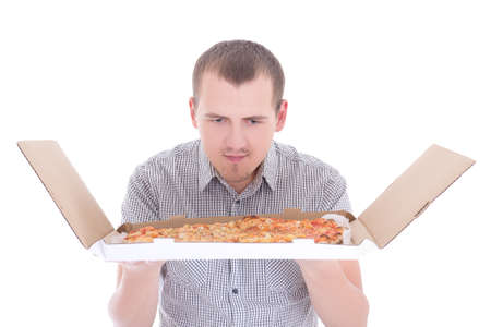young attractive man with big pizza isolated on white backgroundの写真素材