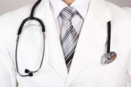 Close up of a doctors white coat with stethoscopeの写真素材