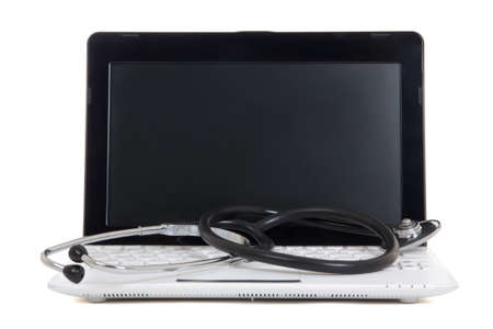 little laptop with blank screen and stethoscope isolated on white 