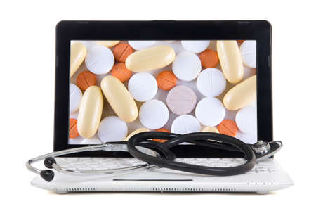 laptop with tablets on screen isolated on white background
